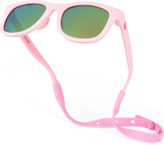 Pink sunglasses with a matching pink strap on a white background