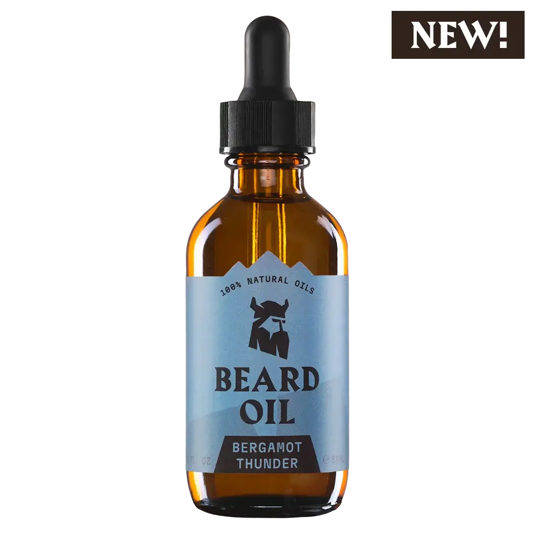 Beard Oil Bergamot Thunder in amber dropper bottle with blue label, natural organic ingredients for healthy soft beard care