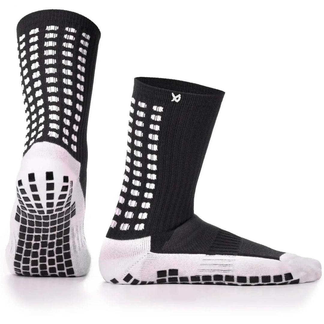 Black and white socks with textured pattern on a white background