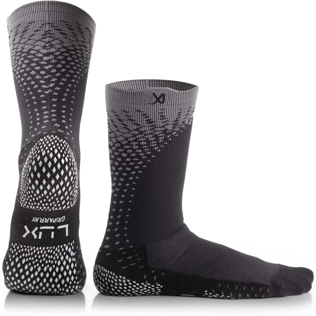 Pair of black and gray socks with unique patterns on a white background