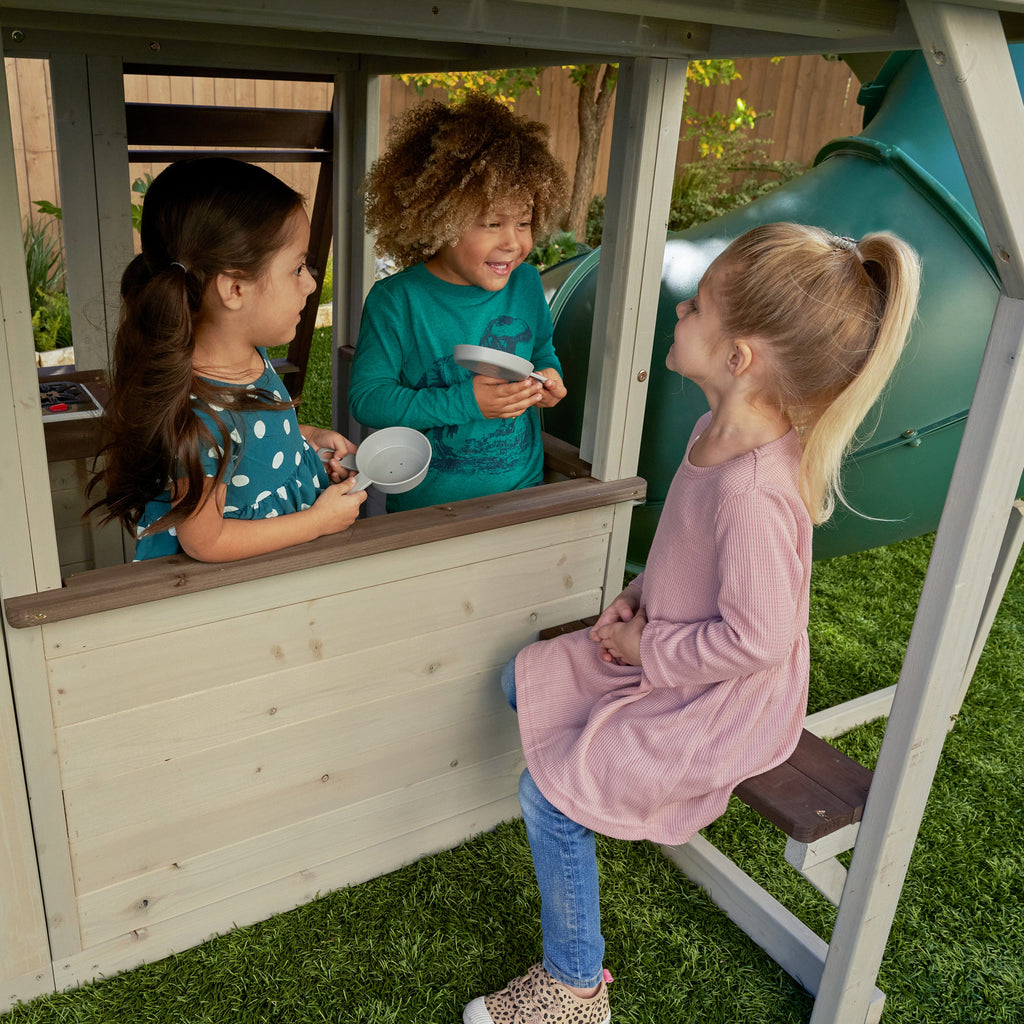 KidKraft Wooden Playhouse with Tube Slide – 2 Storey Outdoor Playground for Kids, Climbing Frame with Turbo Tube Slide & Rock Wall, Garden Play Tower