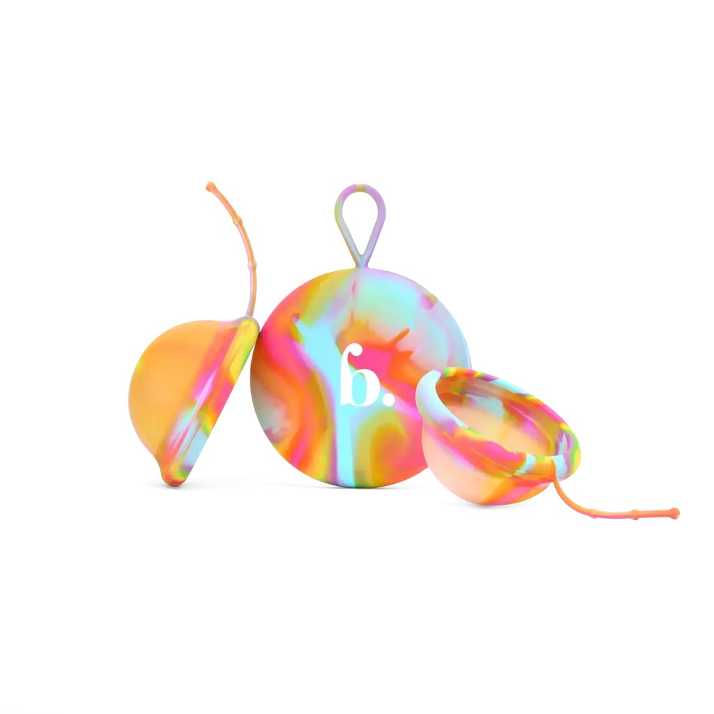 Bodyotics Comfydisc Rainbow Edition reusable menstrual discs with pull-off string and carrying pouch, colorful silicone design.